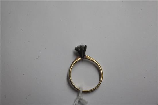 A gold and solitaire diamond ring, size M.